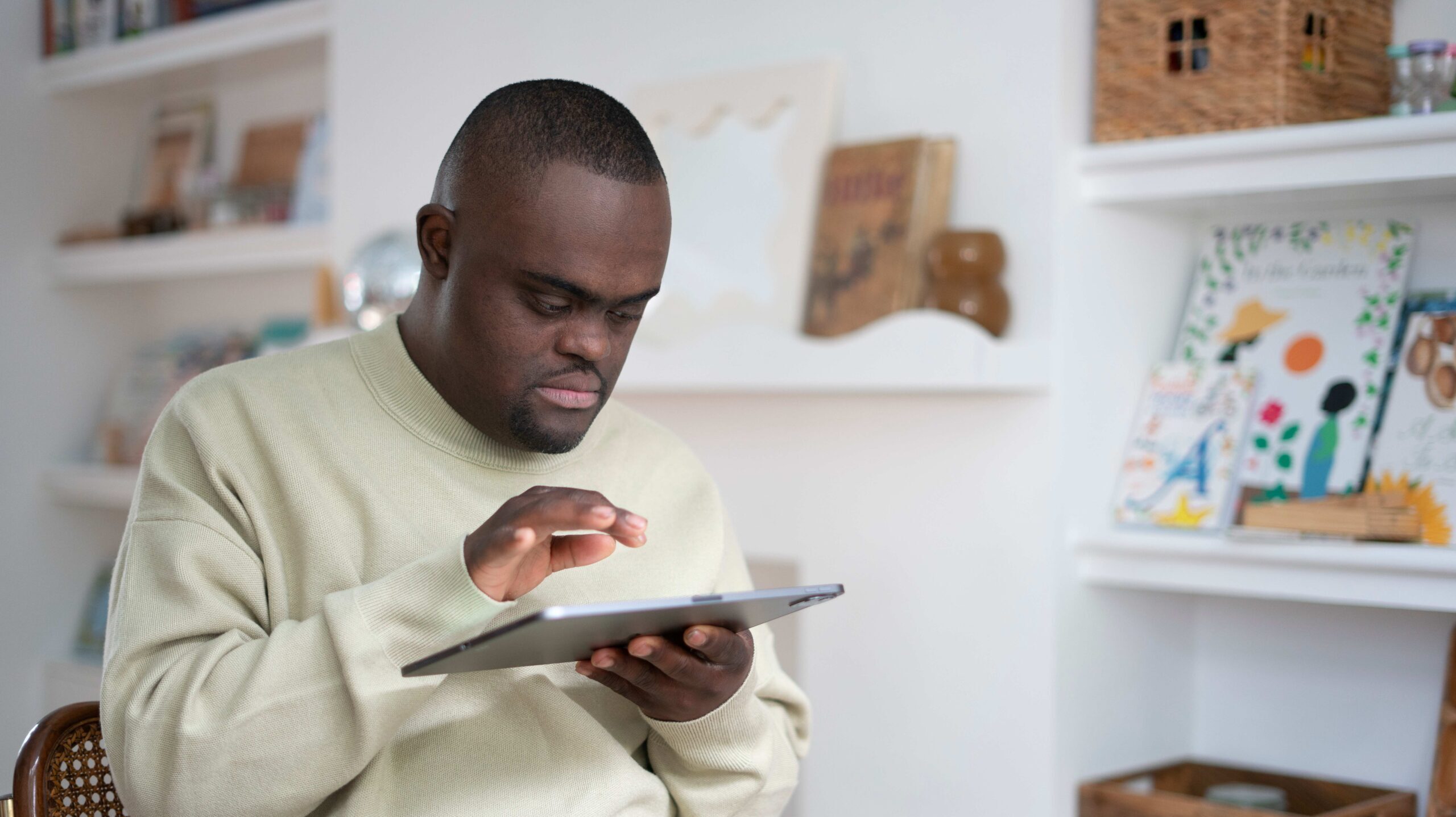 A man reading on his iPad.