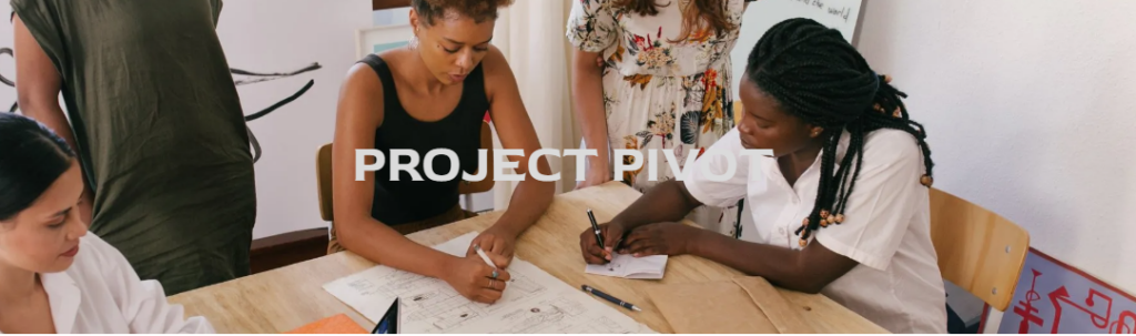 Screenshot from the Project PIVOT landing page. Shows a table of people, mostly women of color, taking notes on paper and having discussion.