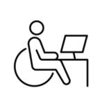 Icon of a person seated in their wheelchair at a desk.